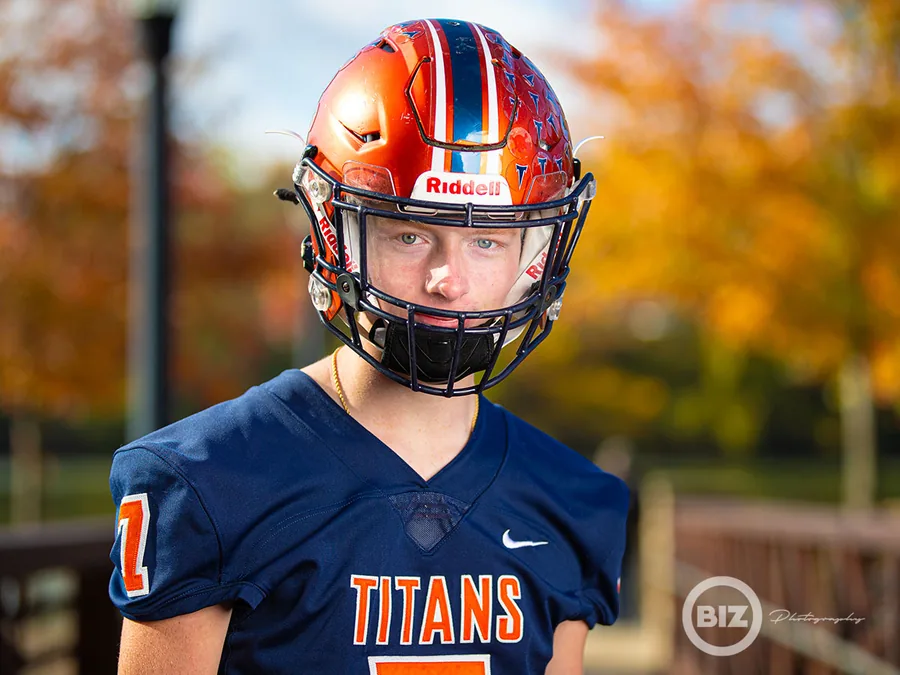 Titans football athlete wearing a helmet for a sports portrait